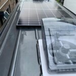 Van conversion : Air-con ,skylights and solar panel installation